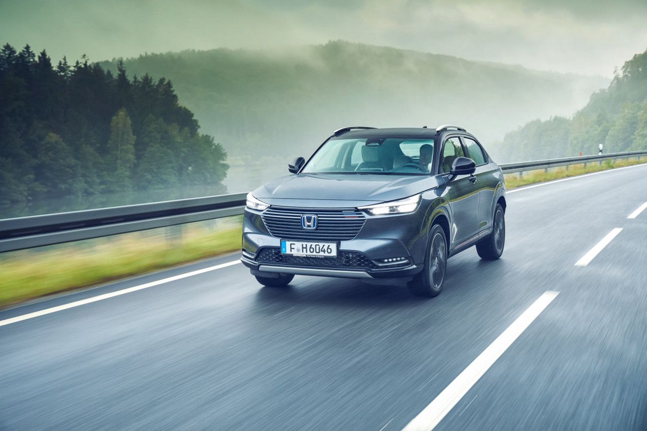 Grey Honda HR-V exterior front driving down the road