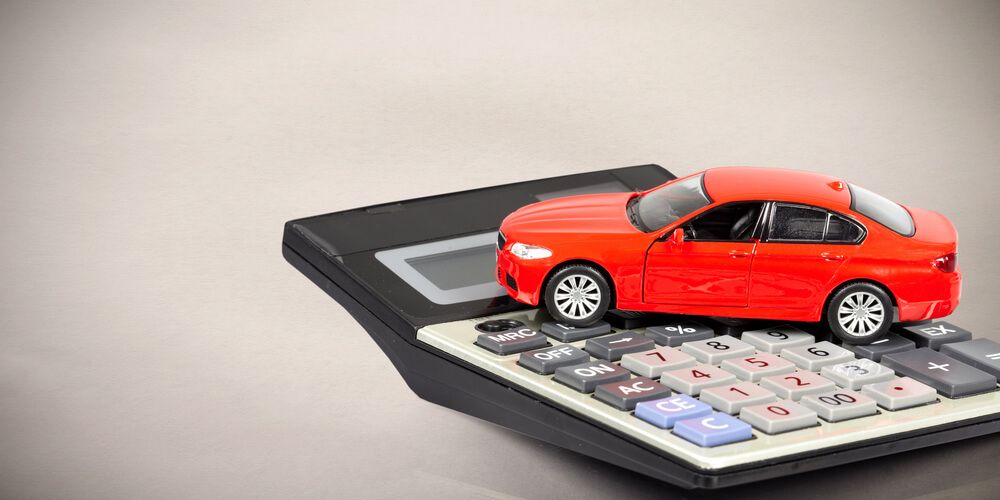 Toy car on top of a calculator