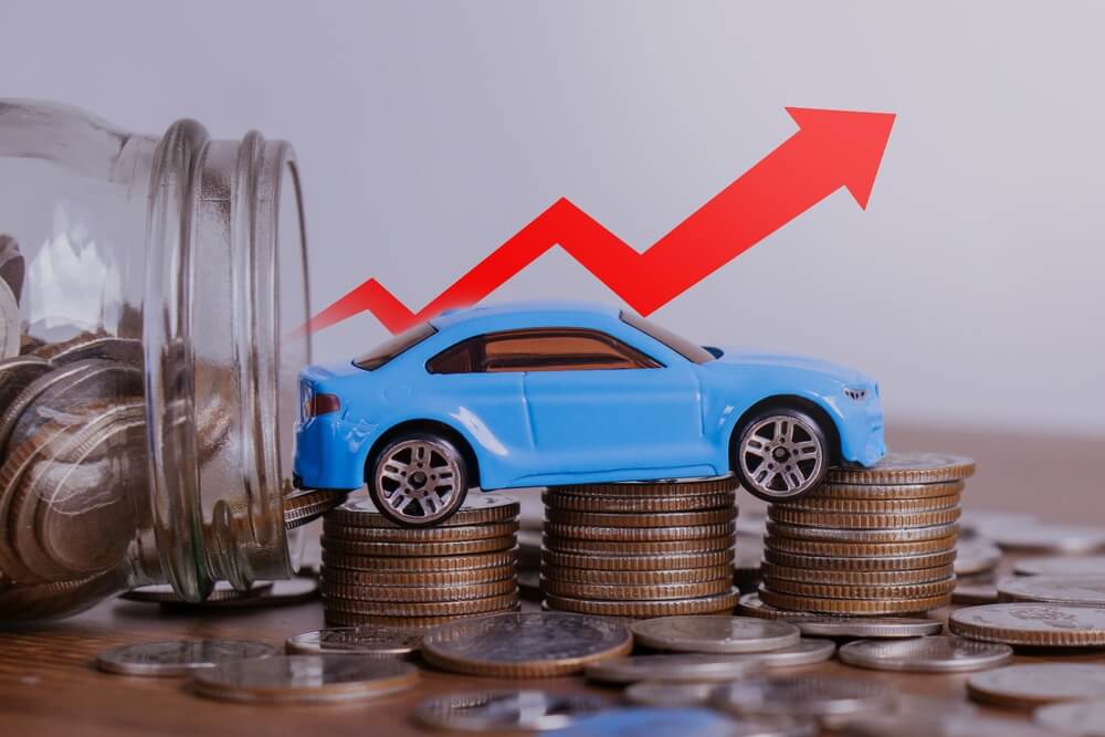 Toy car balancing on coins