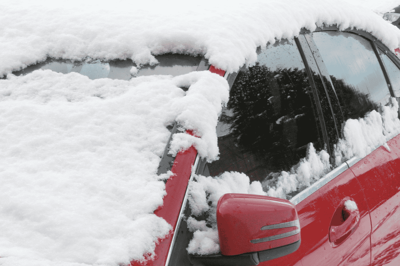 Car Covered in Snow