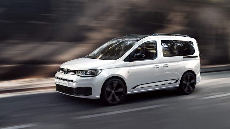 volkswagen caddy 2025 side view in white