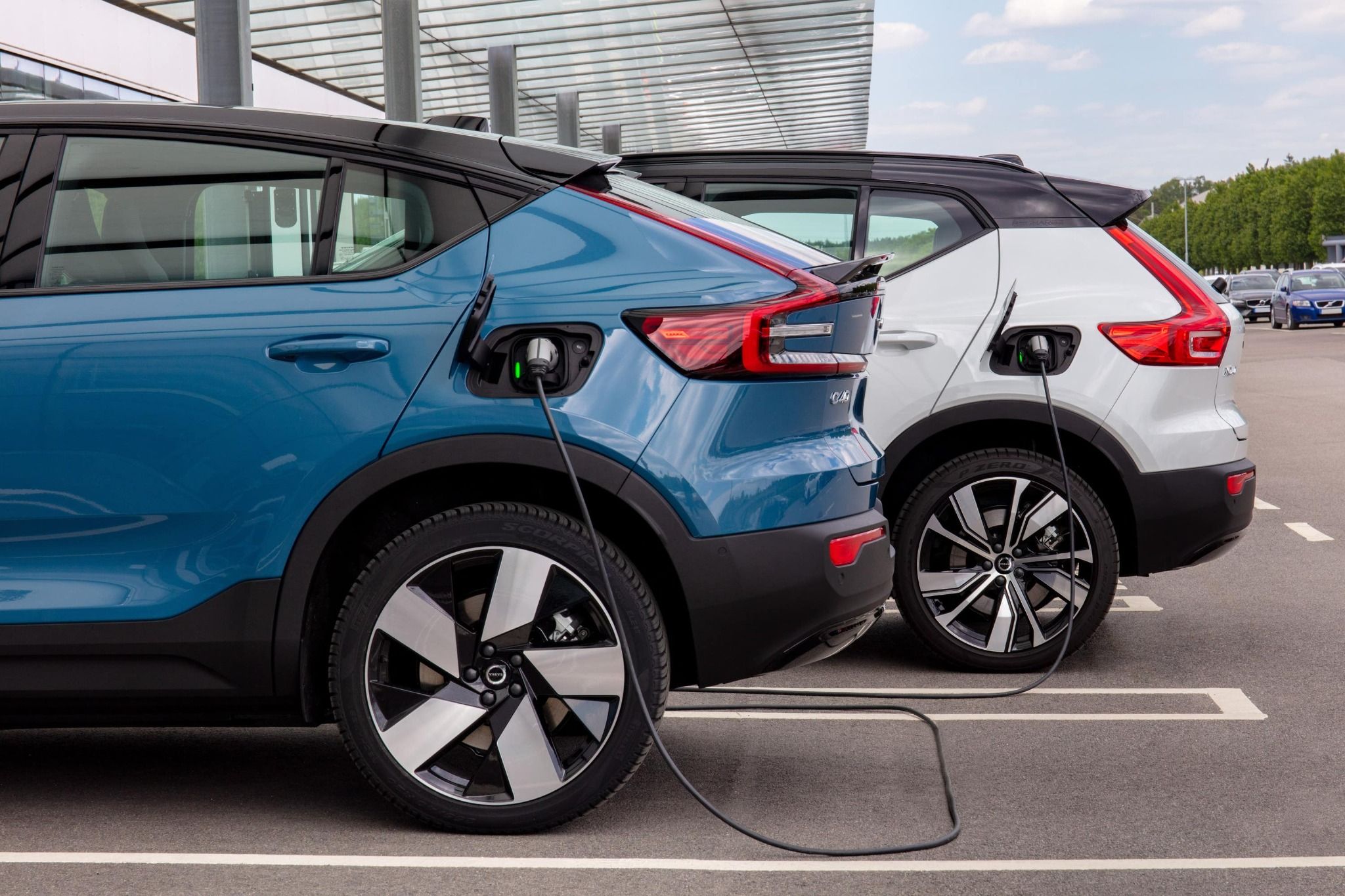 Two electric Volvos charging