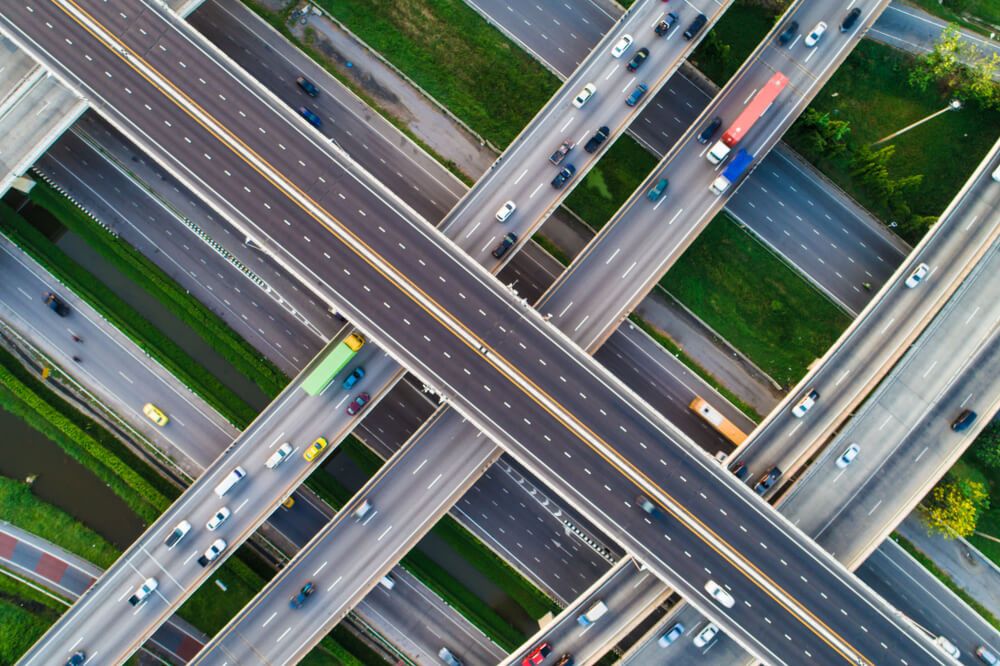 Birds eye view of many roads crossing over each other